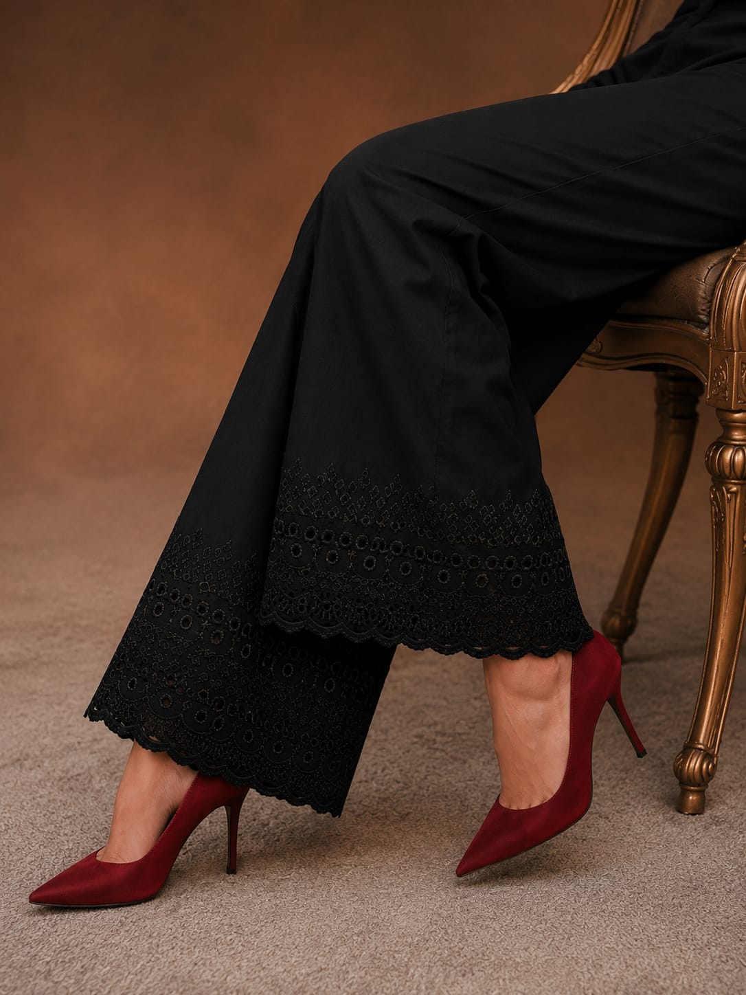 Black  soft cotton trousers with intricate chicken embroidery work and scalloped lace detailing along the hem, stylish comfortable women’s trousers, all sizes available.